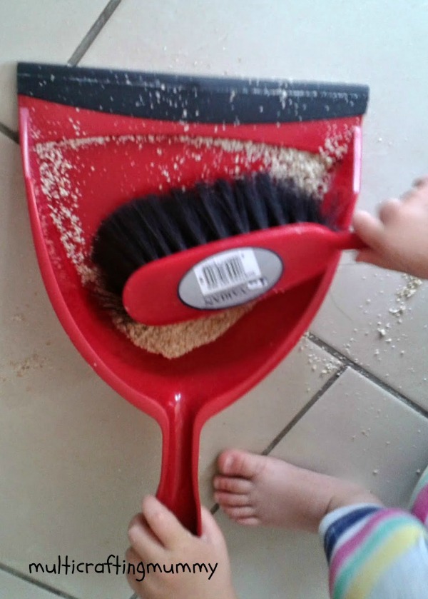 toddler sweeping up