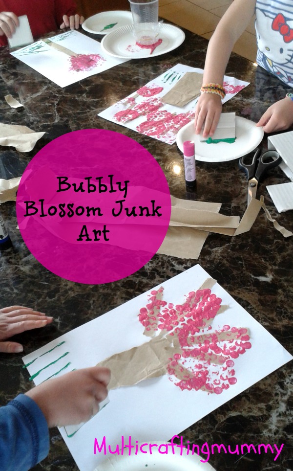 kids paining cherry blossom trees using bubble wrap