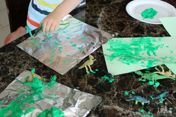 Dinosaur Painting on Foil Action Shot