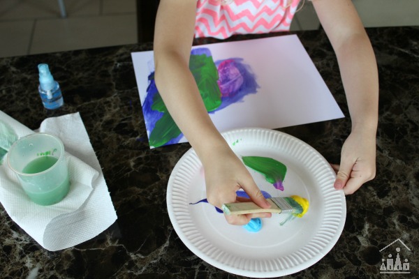 Preschooler Painting on Paper