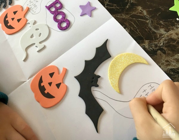 Writing a spooky story using sticker prompts