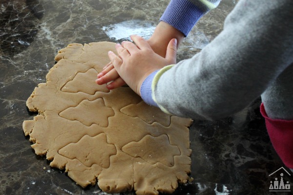 Cutting out Christmas Tree Cookies