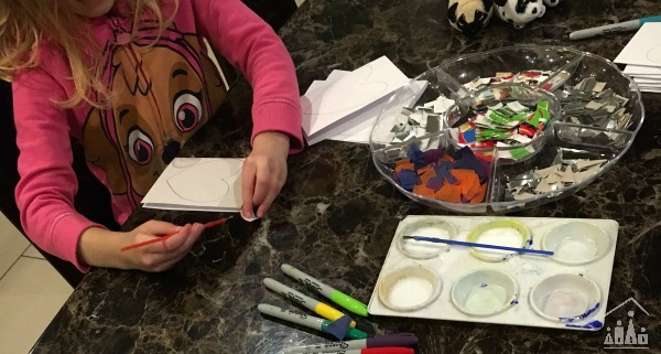 Child making a thank you card