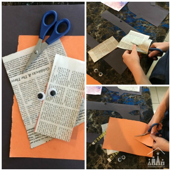Child cutting out a Penguin collage
