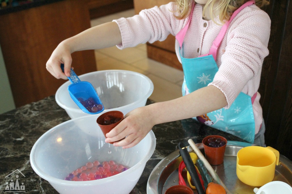 Waterbeads Scoop and Pour Station to work on Fine Motor Skills